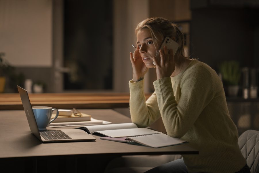 Medium shot woman working late night